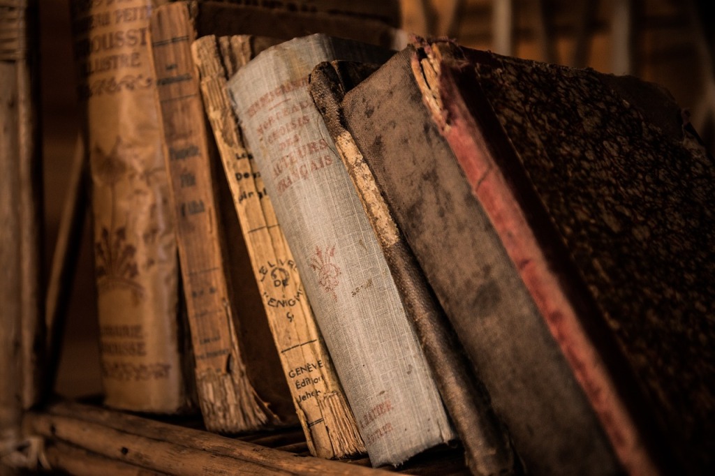 GM Advice: Tattered and mysterious books leaning on a shelf